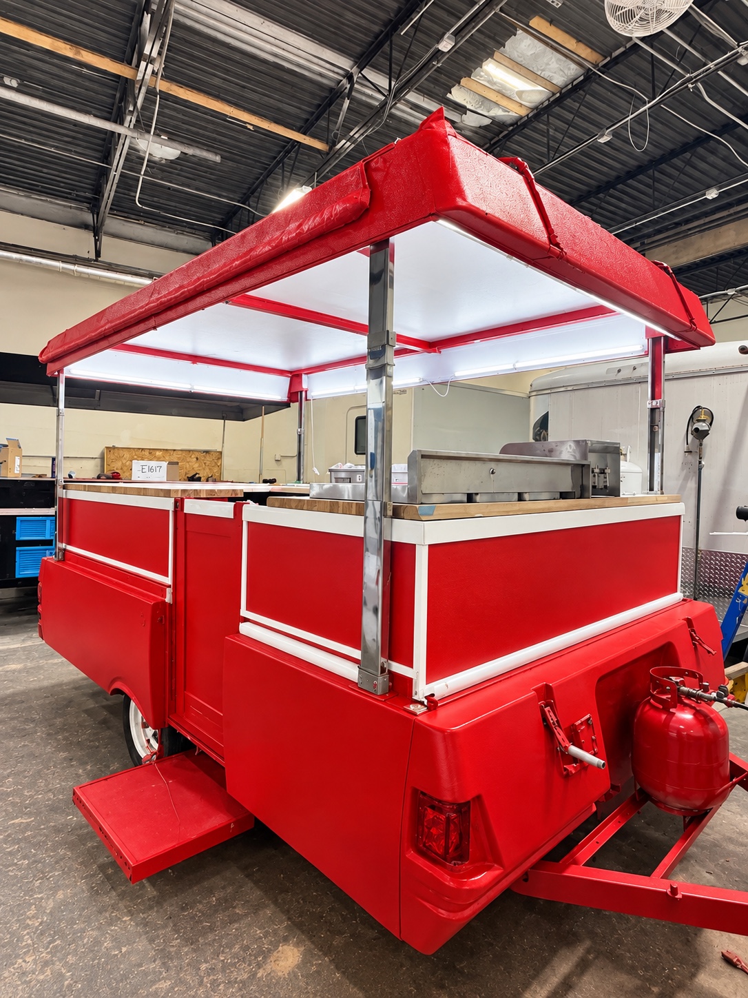 Red Pop Kart open for service from the front